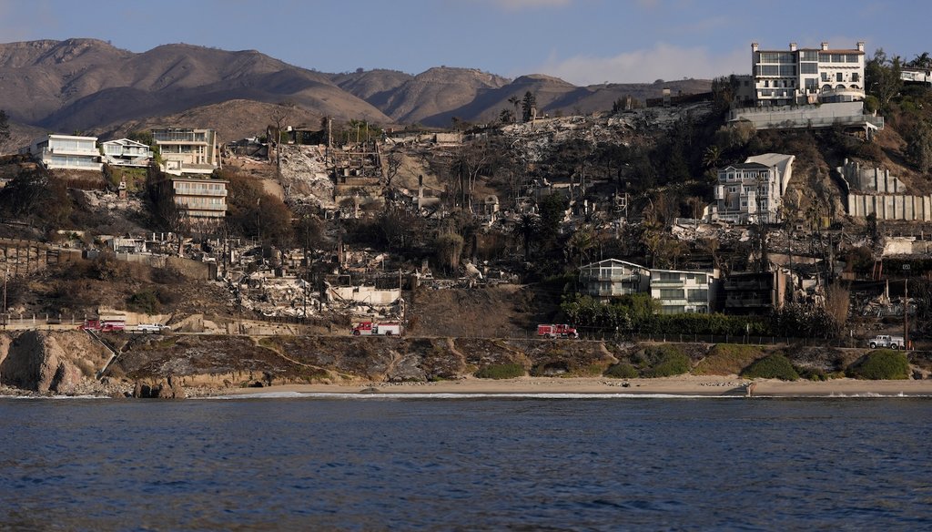 Properties damaged by the Palisades Fire are seen from a coastline perspective in the Pacific Palisades neighborhood of Los Angeles, Friday, Jan. 17, 2025. (AP)
