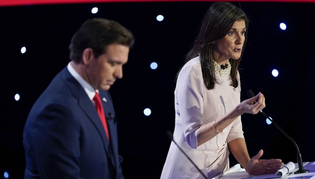 Former Ambassador Nikki Haley, right, speaks at the CNN Republican presidential debate with Florida Gov. Ron DeSantis on Jan. 10, 2024, at Drake University in Des Moines, Iowa. (AP)