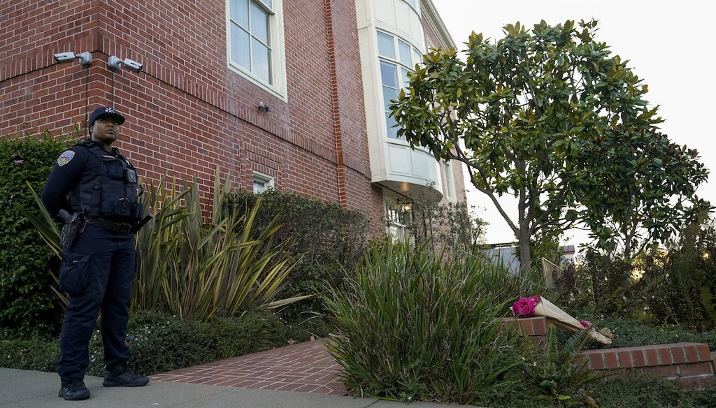 A police officer stands outside the home of House Speaker Nancy Pelosi and her husband Paul Pelosi in San Francisco, Oct. 28, 2022. Paul Pelosi was attacked and severely beaten by an assailant with a hammer early Friday, officials said. (AP)